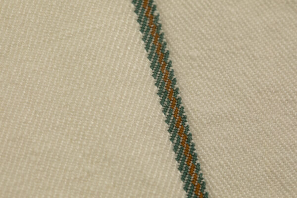 All Hemp American 2/2 raw selvedge denim woven with Draper looms featuring Tuscarora Mills green and brown.